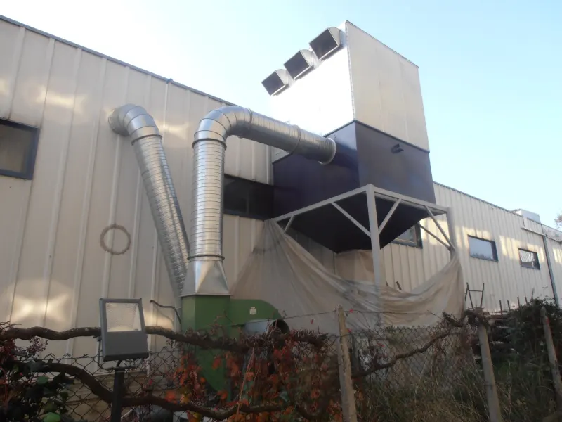 Dust collection filter and ductwork installed outside the building
