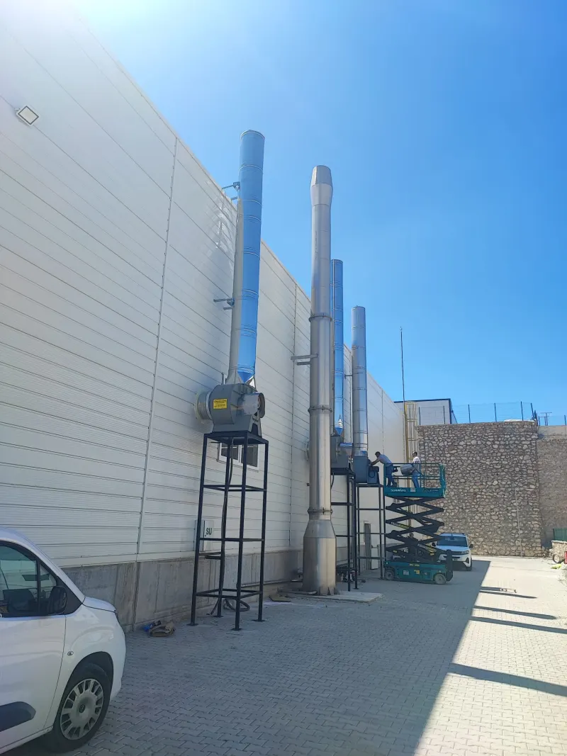 Exhaust fans and stacks along the facade